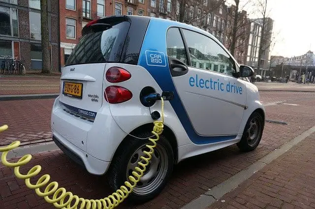 Electric vehicle getting charged; charging EV