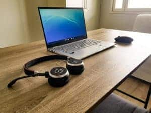 laptop, headphones and a mouse for working remotely
